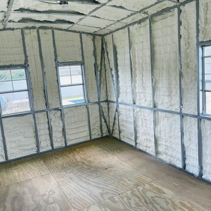 Closed-cell spray foam insulation applied to wall cavities in a residential project in Salisbury